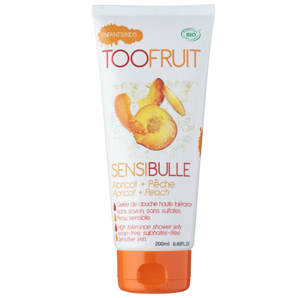 Weiß-orange Tube. TOOFRUIT Sensibulle Duschgel, Pfirsich-Aprikose. Bio-Siegel. Abbildung von Pfirsich- und Aprikosenstücken.