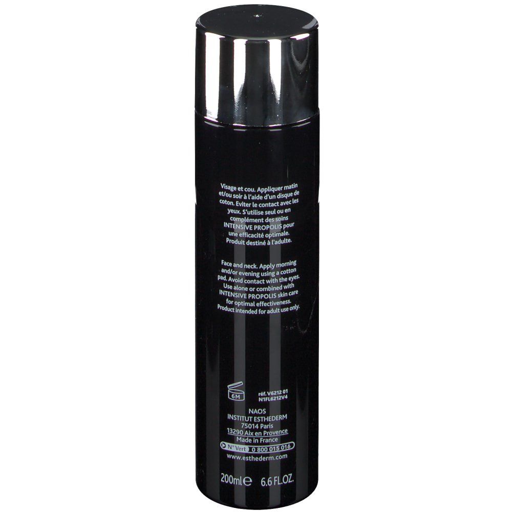 Schwarze Flasche mit silbernem Deckel. Text auf der Flasche. INSTITUT ESTHEDERM PARIS. Aufschrift: Intensiv Propolis.