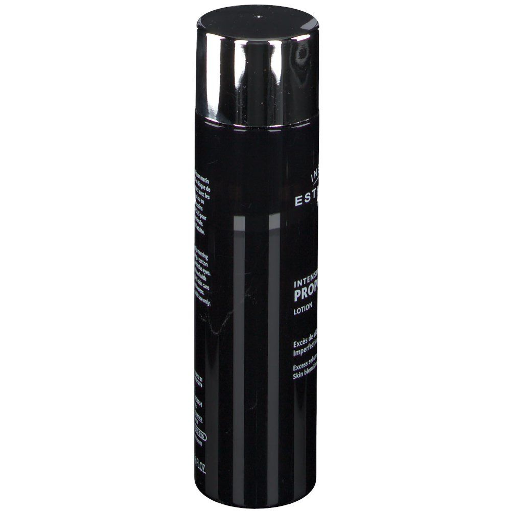 Schwarze Flasche mit silbernem Deckel. Vertikale Streifen. INSTITUT ESTHEDERM PARIS. Aufschrift: Intensiv Propolis Lotion.
