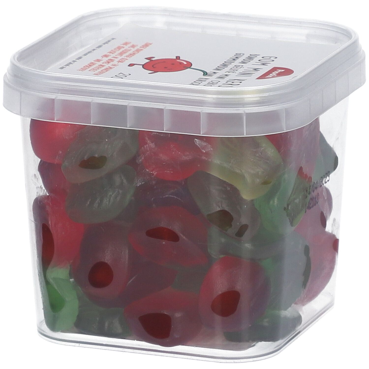 Transparente Dose mit Kirsch-Fruchtgummi. Deckel mit Produktnamen und Kirsch-Illustration. Rote und grüne Gummibärchen.