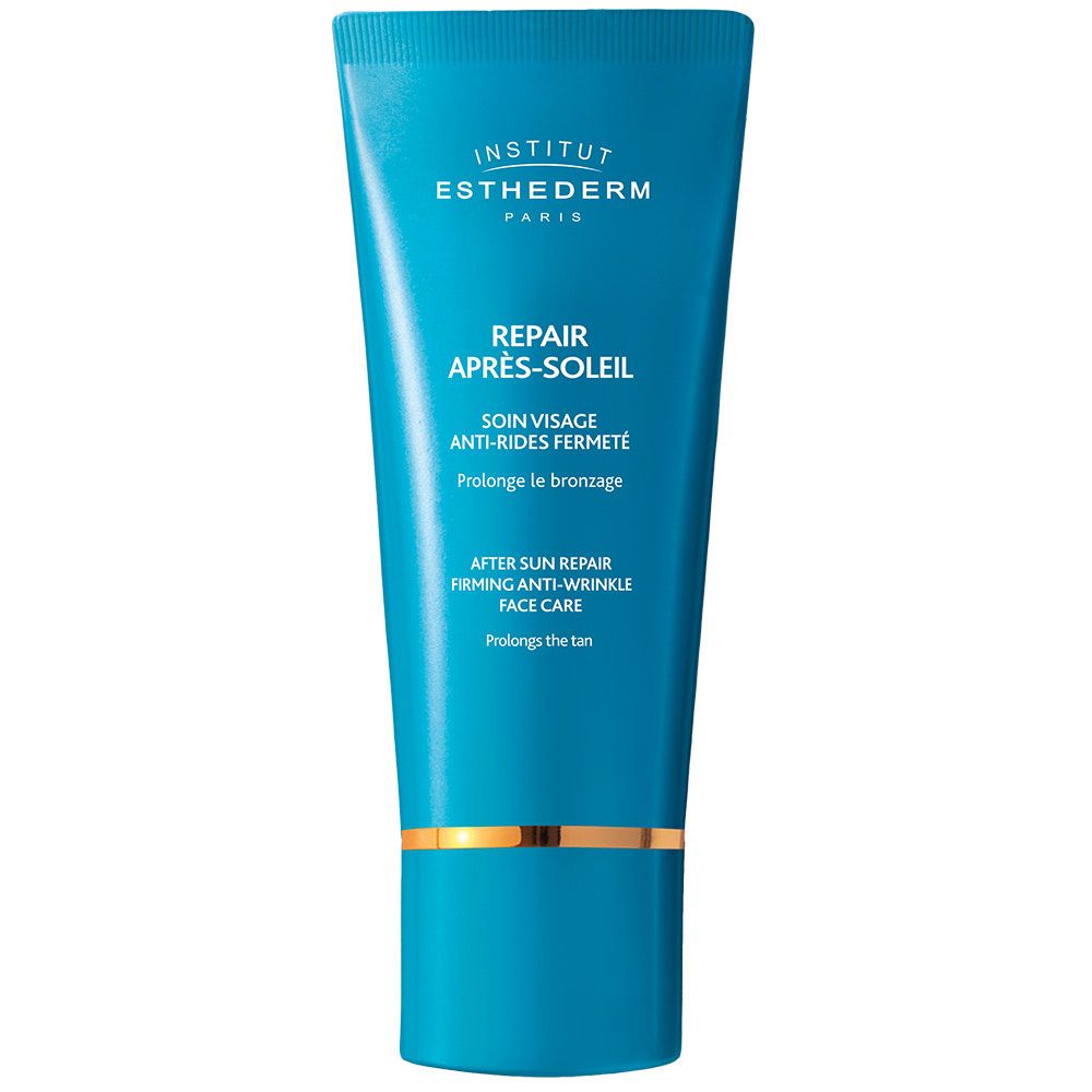 Blau-türkisfarbene Tube mit goldfarbenen Akzenten. Text: INSTITUT ESTHEDERM PARIS, REPAIR APRÈS-SOLEIL.