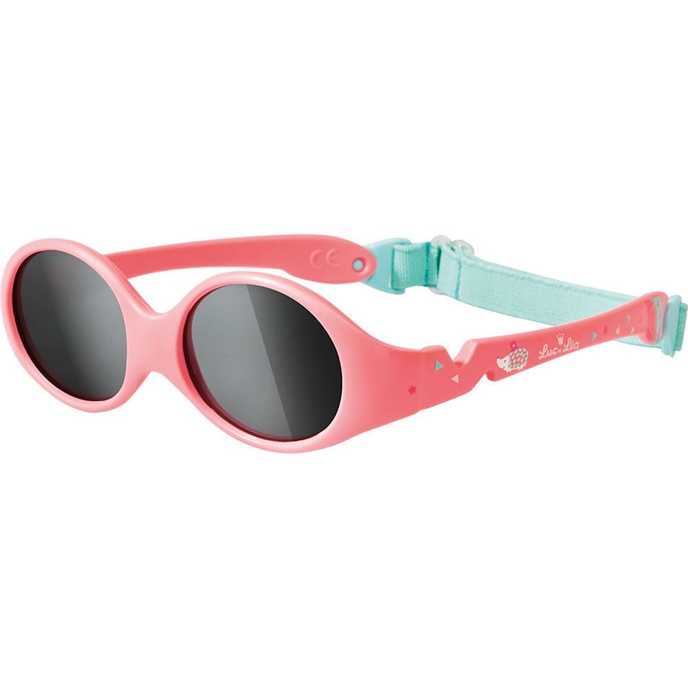 Rosa Baby-Sonnenbrille mit runden Gläsern und verstellbarem, türkisblauem Band. Marke Luc & Léa.