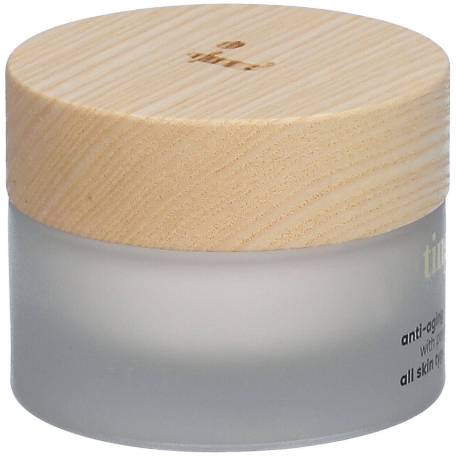 Tinge Tagescreme für Frauen. Glasbehälter mit Holzdeckel. Aufschrift: Anti-Aging, Granatapfel und Braunalgen, alle Hauttypen.