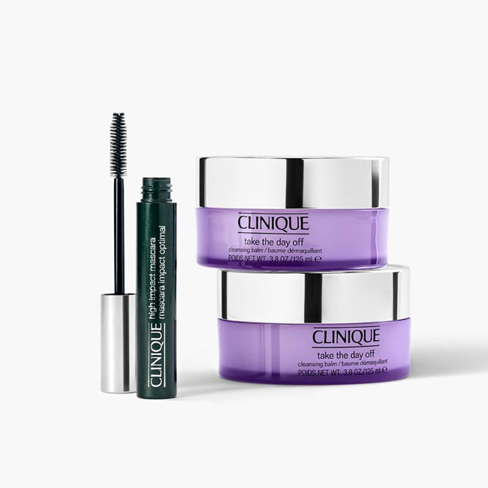 Zwei lila Tiegel, Mascara und grünes Mascaragehäuse. Aufschrift: CLINIQUE take the day off.