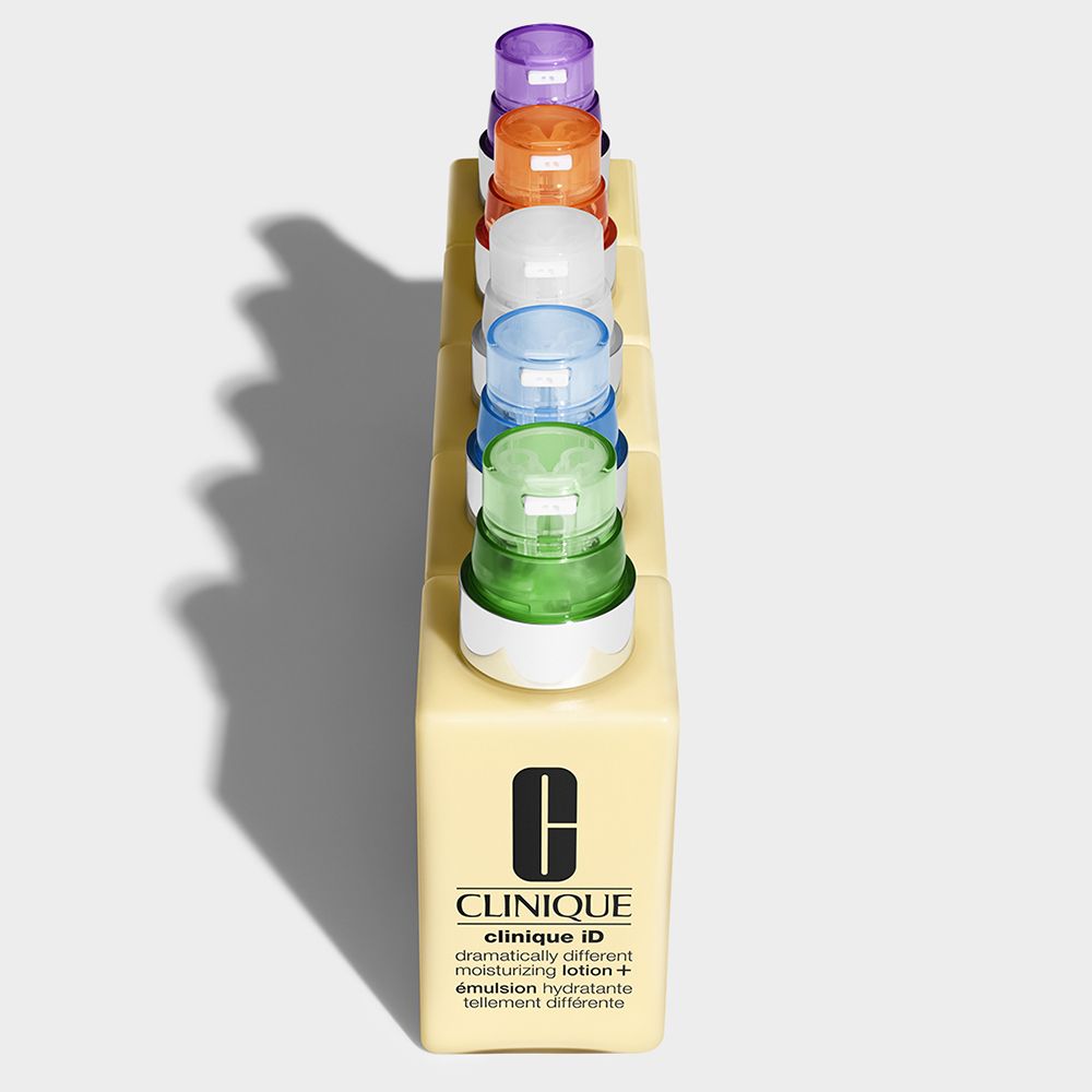 Sechs CLINIQUE iD™ Produkte in einem Display. Verschiedene Kartuschenfarben.