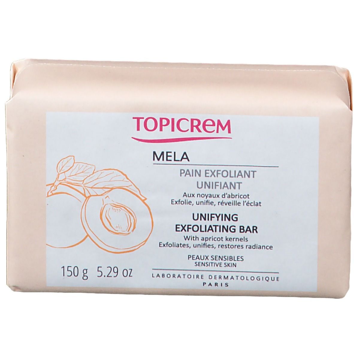 TOPICREM Peeling-Seife, verpackt. Rechteckige Seife mit Aufdruck. Enthält Aprikosenkerne. Text: "Unifying Exfoliating Bar".