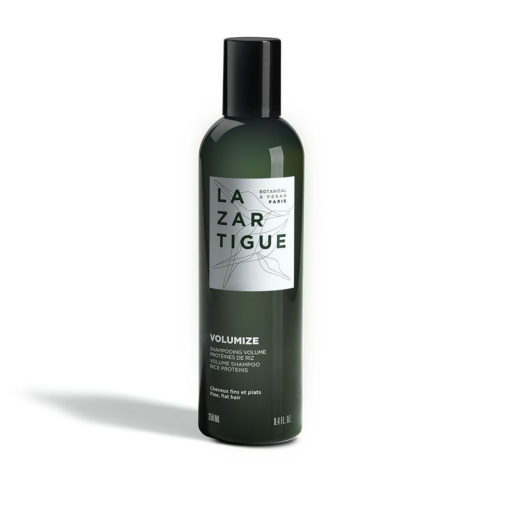 Grüne Flasche mit schwarzem Deckel. Aufschrift LAZARTIGUE VOLUMIZE. 250ml. Für feines, plattes Haar.