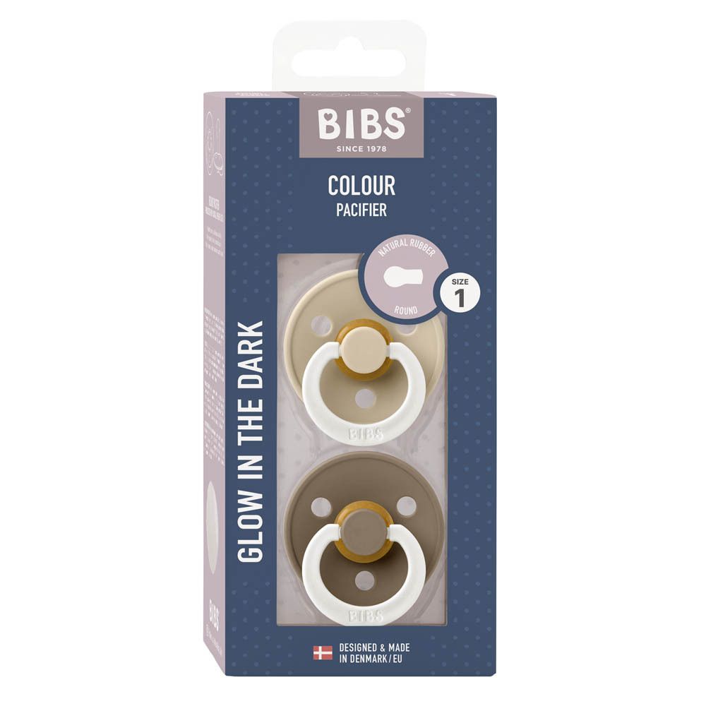 Verpackung mit zwei Schnullern. Marke BIBS. Farbe: Braun und Beige. Leuchtet im Dunkeln. Größe 1.