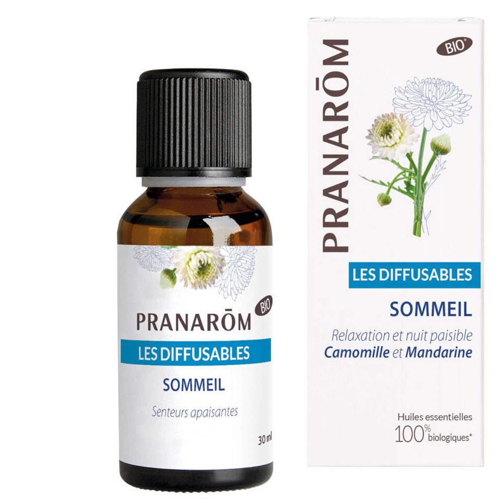 Braune Glasflasche mit schwarzem Deckel und Etikett. Daneben eine weiße Schachtel mit Produktinformationen und Logo.