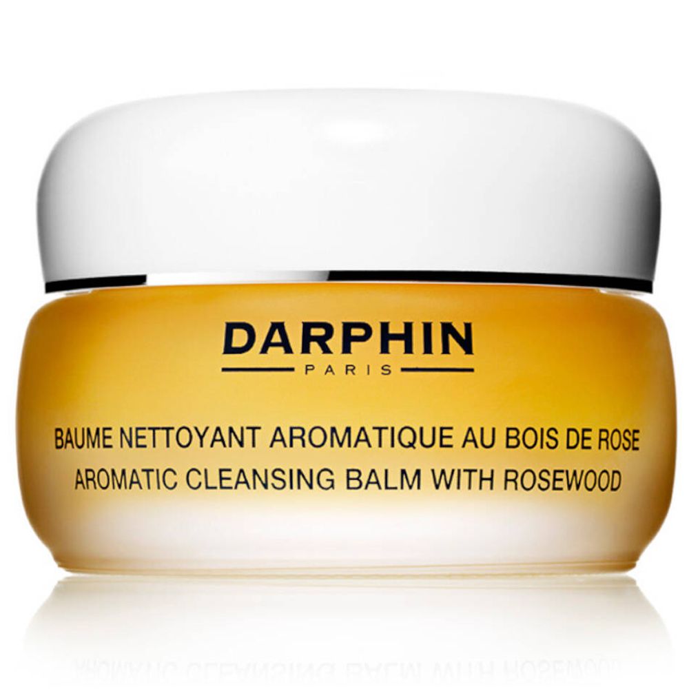 Gelb-goldener Tiegel mit weißem Deckel. Schriftzug DARPHIN PARIS. Produktbezeichnung: BAUME NETTOYANT AROMATIQUE AU BOIS DE ROSE.