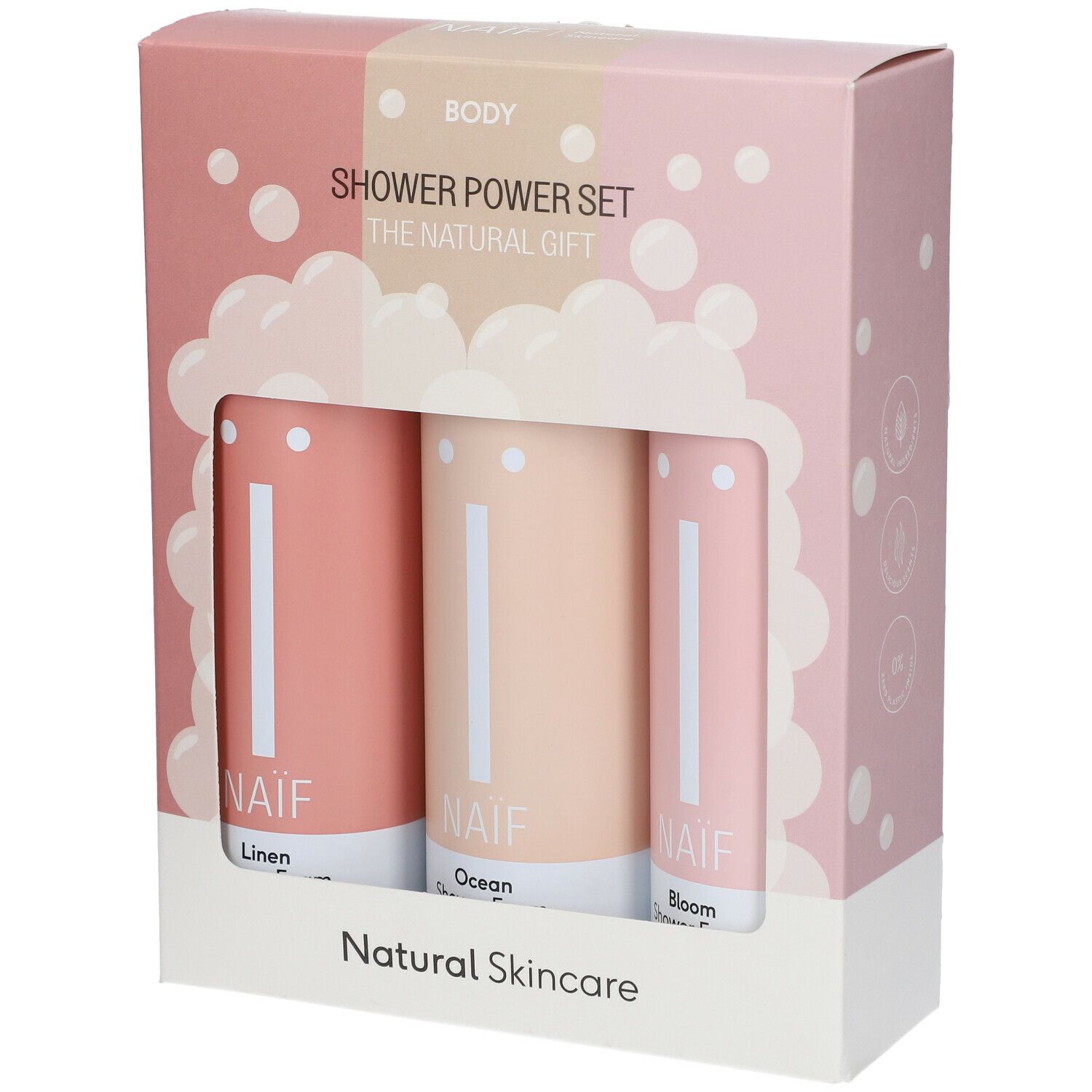 Geschenkset mit drei zylindrischen Produkten in einer rosa Schachtel. Sichtbar sind die Markennamen NAÏF und Produktnamen.