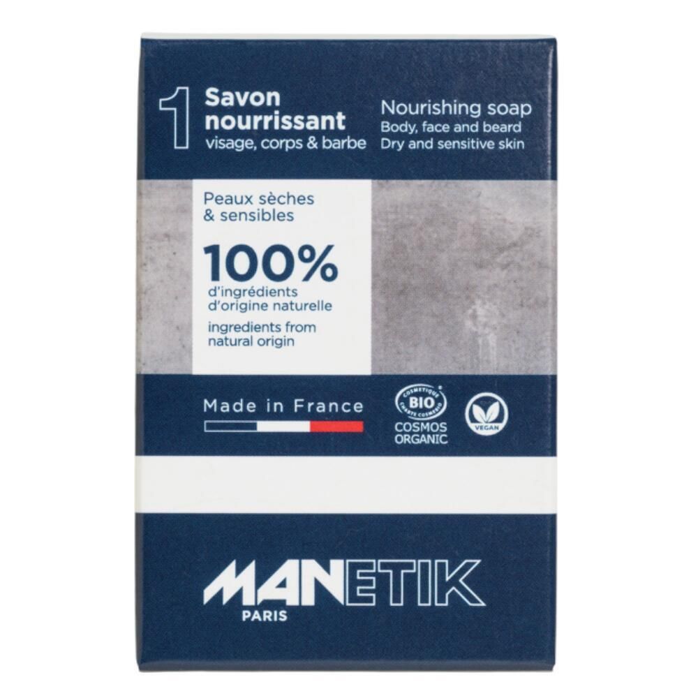 Kartonverpackung. MANETIK Nährende Seife. Text: Savon nourrissant, Peaux sèches & sensibles, 100% d'ingrédients d'origine naturelle. Bio-Siegel.