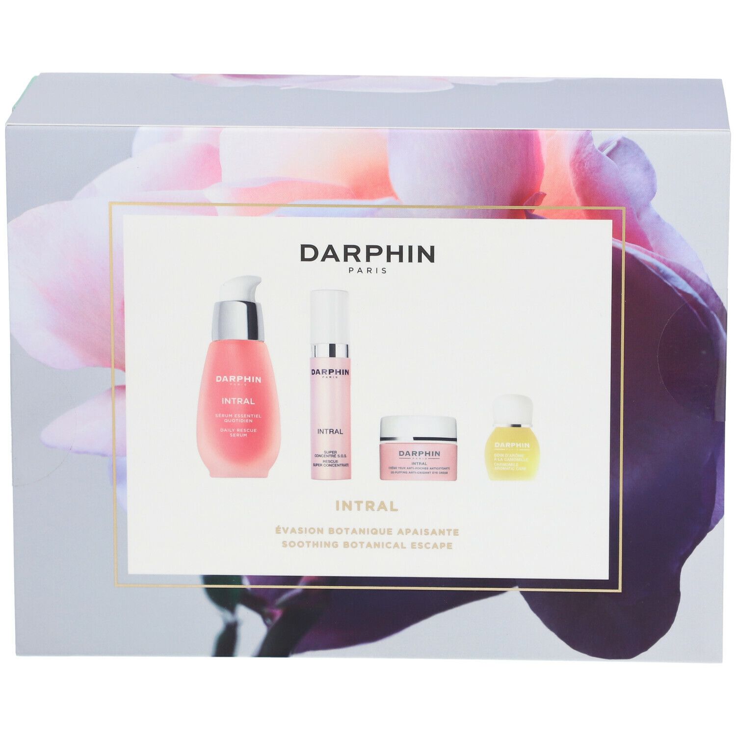 Geschenkset mit vier Produkten. Rosa Flüssigkeiten und Cremes in weißen und durchsichtigen Behältern. Aufschrift: DARPHIN INTRAL.