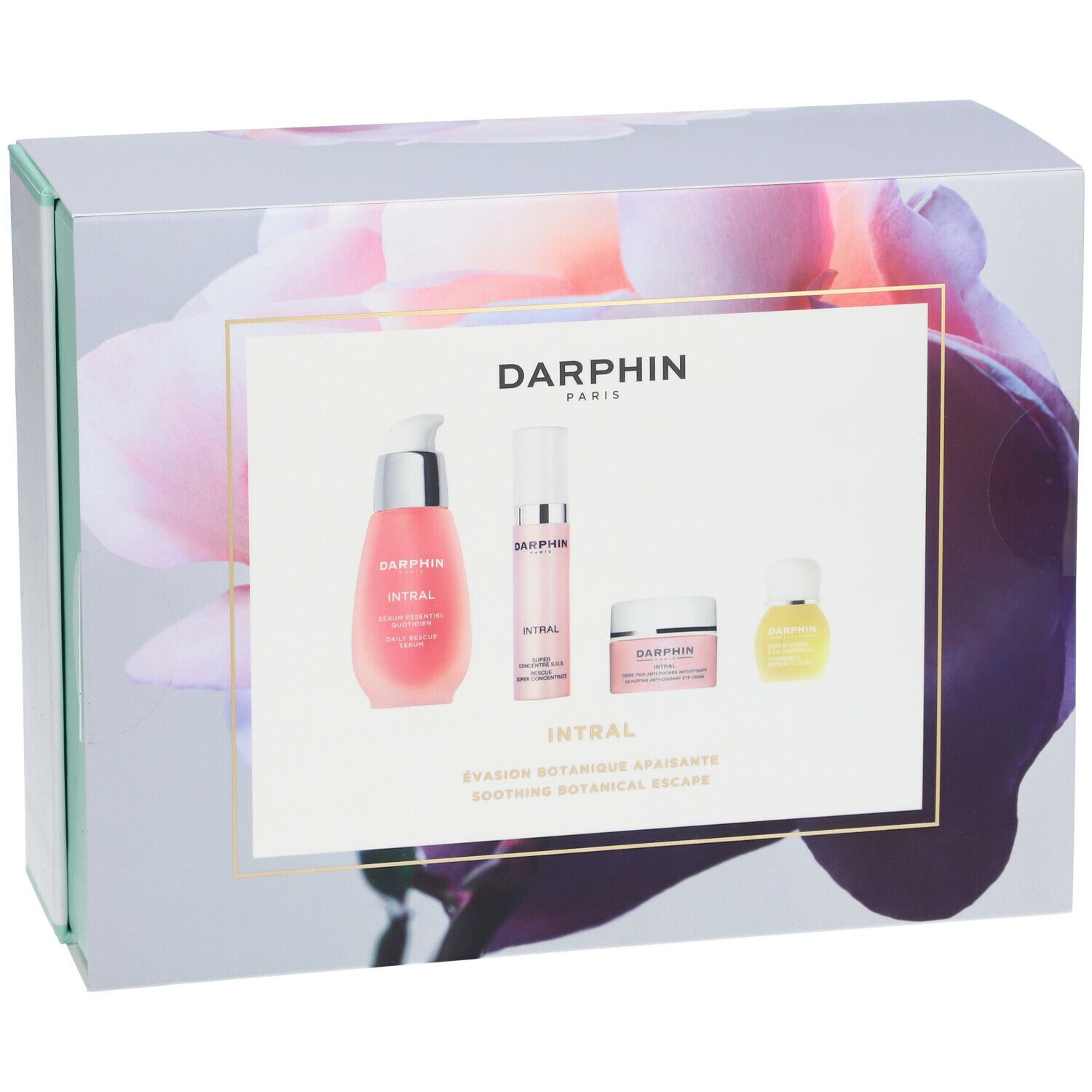 Geschenkbox mit floralem Design und vier Produkten. Aufschrift: DARPHIN. Rosa Flüssigkeiten und Cremes. Mintgrüne und weiße Akzente.