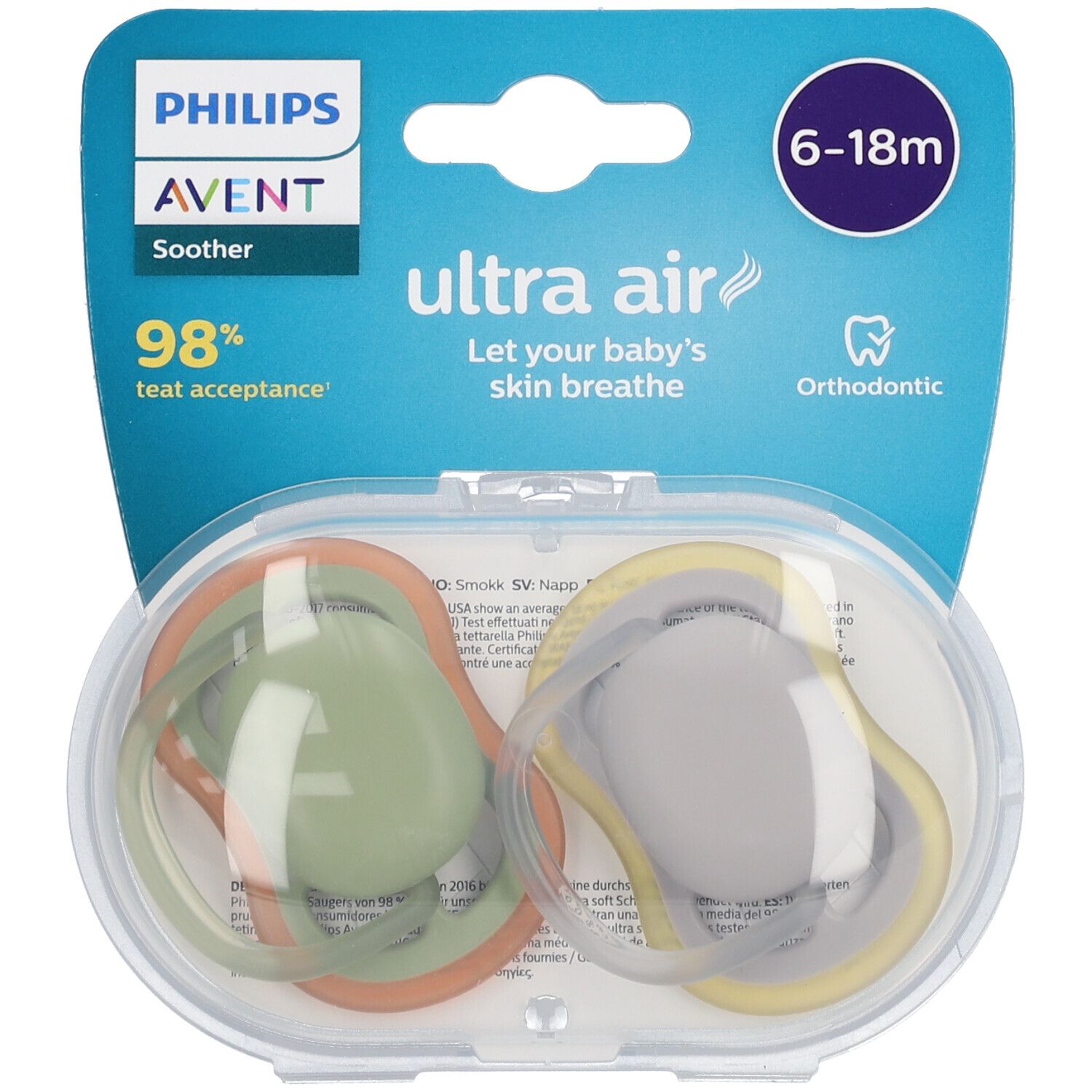 Zwei Schnuller in einer transparenten Hülle. Grün und gelb-orangefarbene Ringe. Verpackung mit Philips Avent Logo und Altersangabe 6-18m.