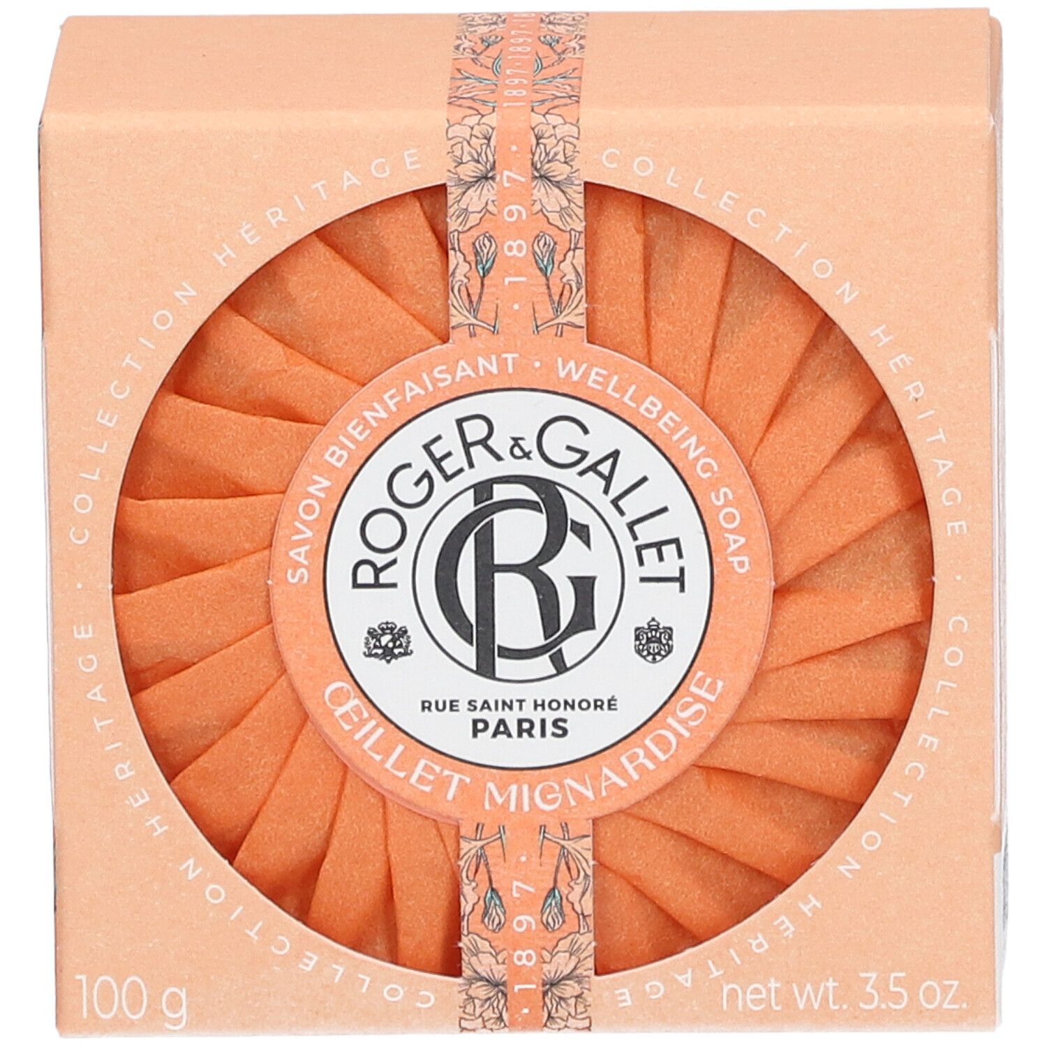 Kartonverpackung mit Seife. Orangefarbene Seife mit Logo. Text: Roger & Gallet, Œillet Mignardise, 100 g, 3.5 oz.
