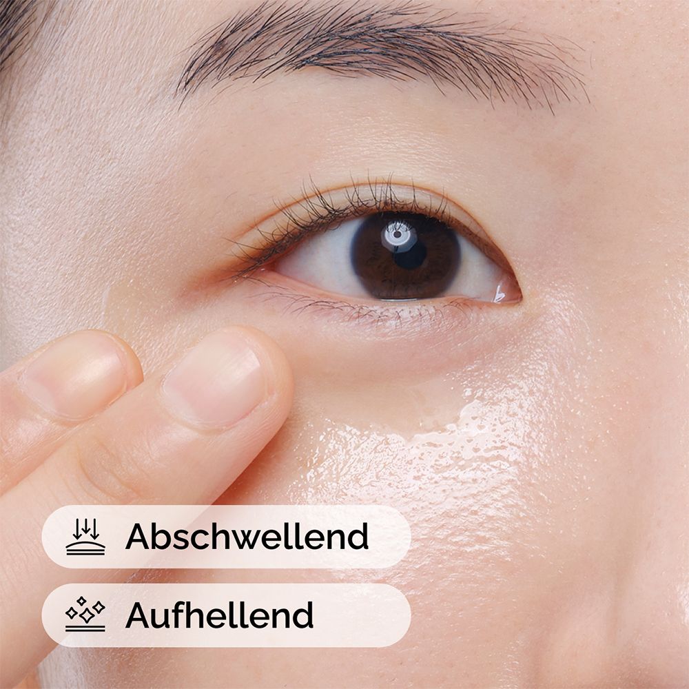 Nahaufnahme eines Auges mit Flüssigkeit. Text: Abschwellend, Aufhellend.