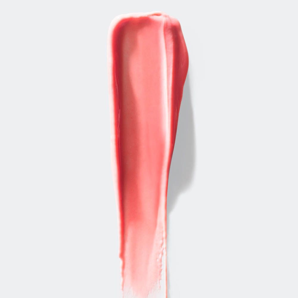 Ein einzelner Lippenstift-Applikator trägt glänzenden, dunkelroten Lippenstift auf.
