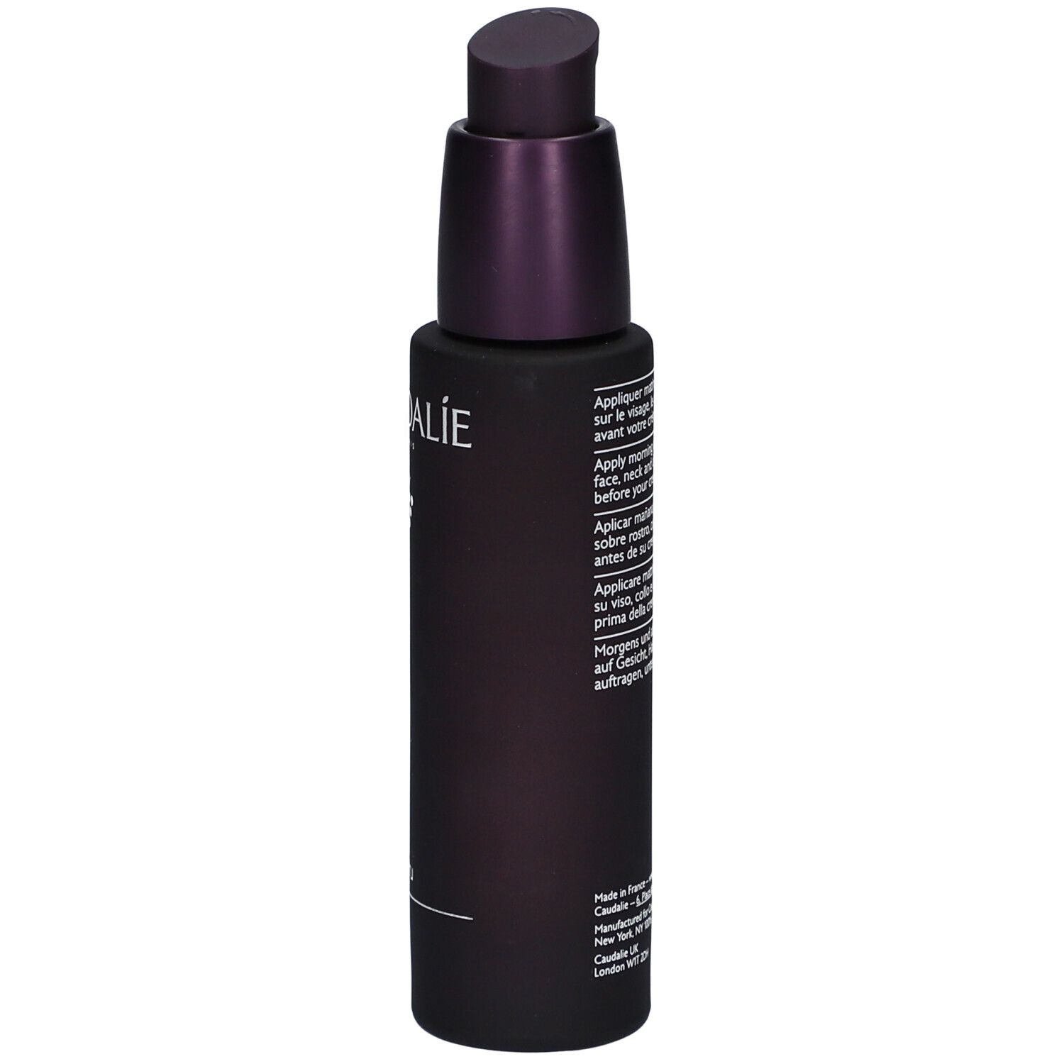 Dunkelviolette Flasche mit Pumpe. Seite mit Produktinformationen und Text.