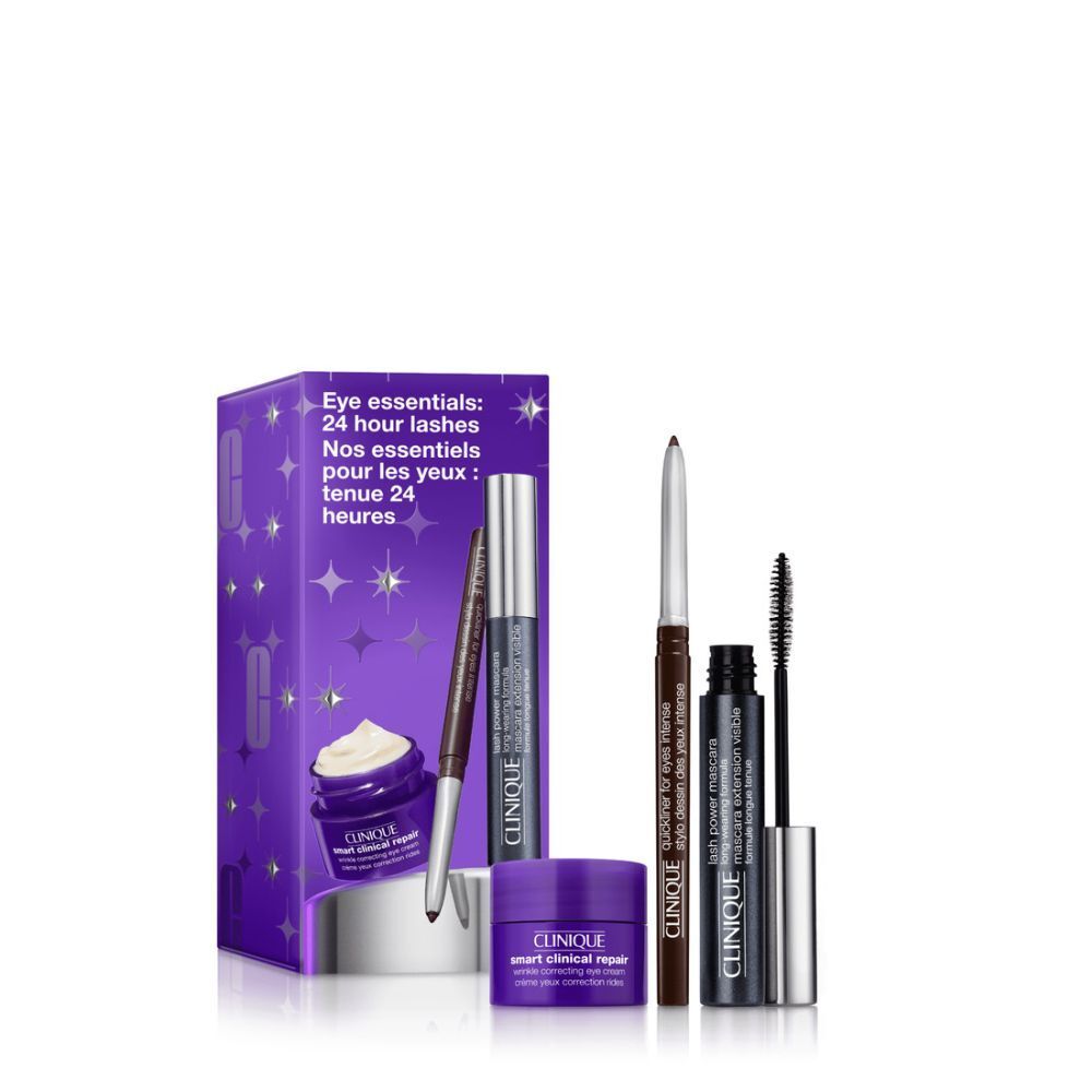 Clinique Eye Essential Set. Enthält Mascara, Eyeliner und Augencreme. Lila Verpackung mit Produktnamen. Sterne als Designelement.