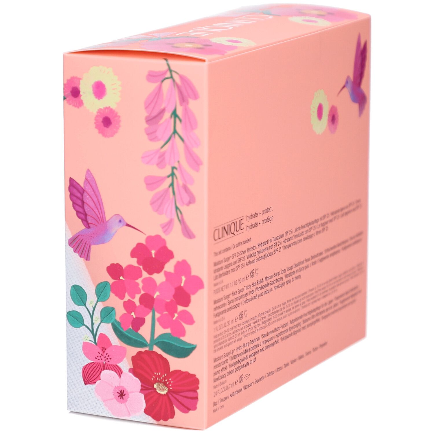 Seitenansicht der Geschenkbox. Rosa Box mit Produktinformationen und floralem Muster. Text in mehreren Sprachen.