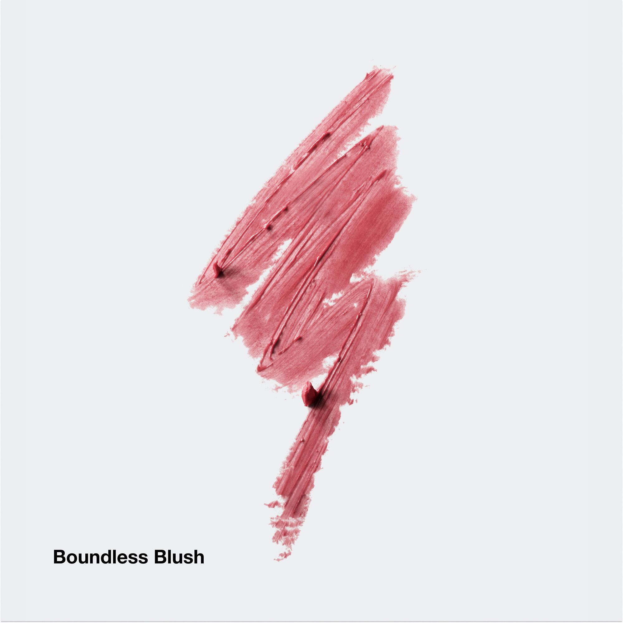Rosa Lippenstift-Abstrich. Produktname Boundless Blush. Auf hellem Hintergrund.