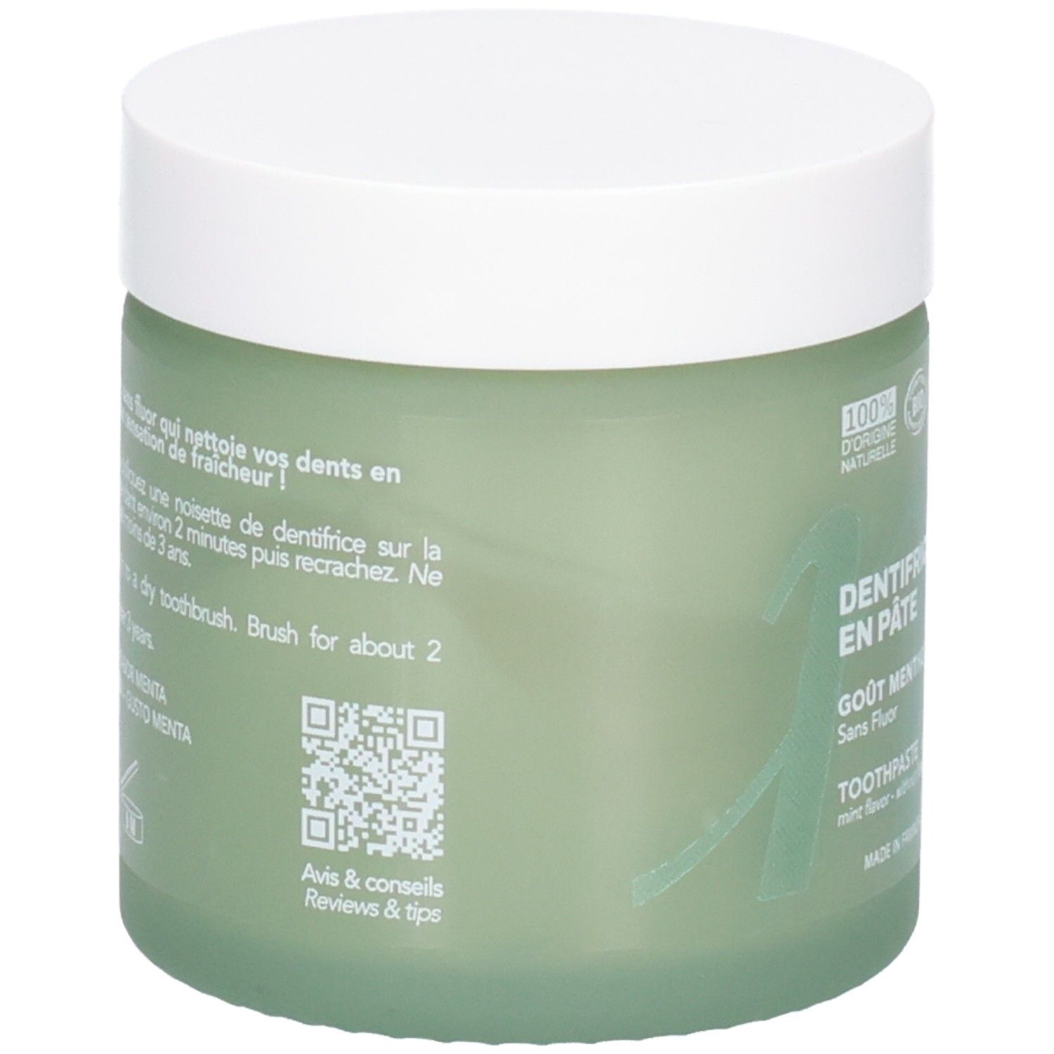 Grüner Glastiegel mit weißem Deckel, enthält Zahnpasta. Beschriftung: "Dentifrice en pâte".