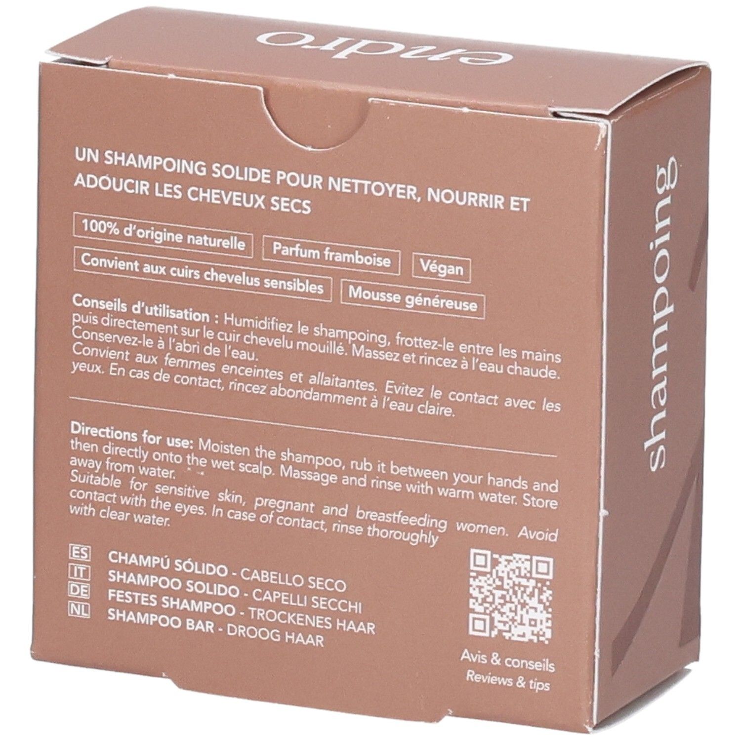 Braune Kartonverpackung für festes Shampoo, mit Text in mehreren Sprachen und einem QR-Code.