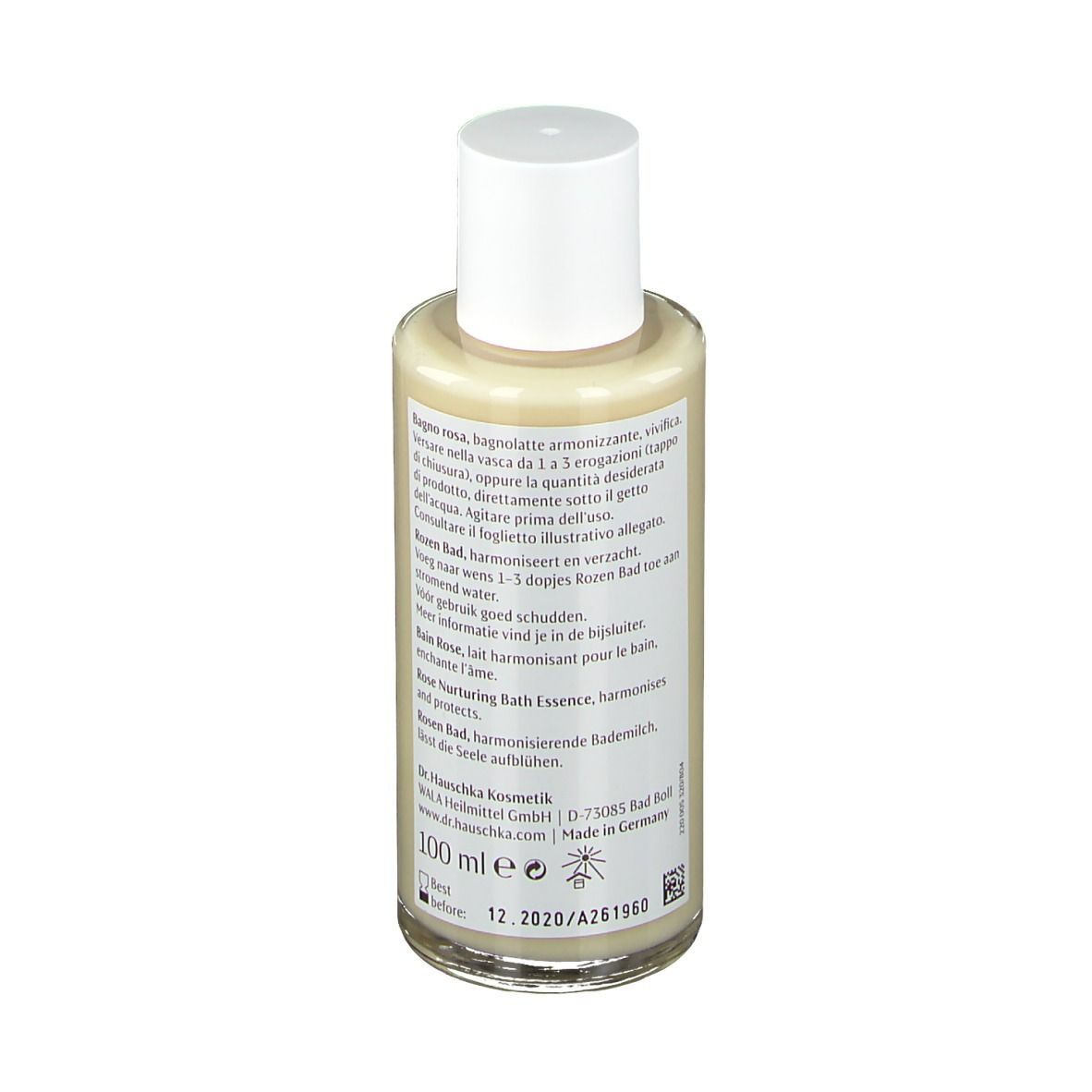 Glasflasche mit weißem Deckel. Etikett mit Text und rotem Streifen. Rückseite mit Text.