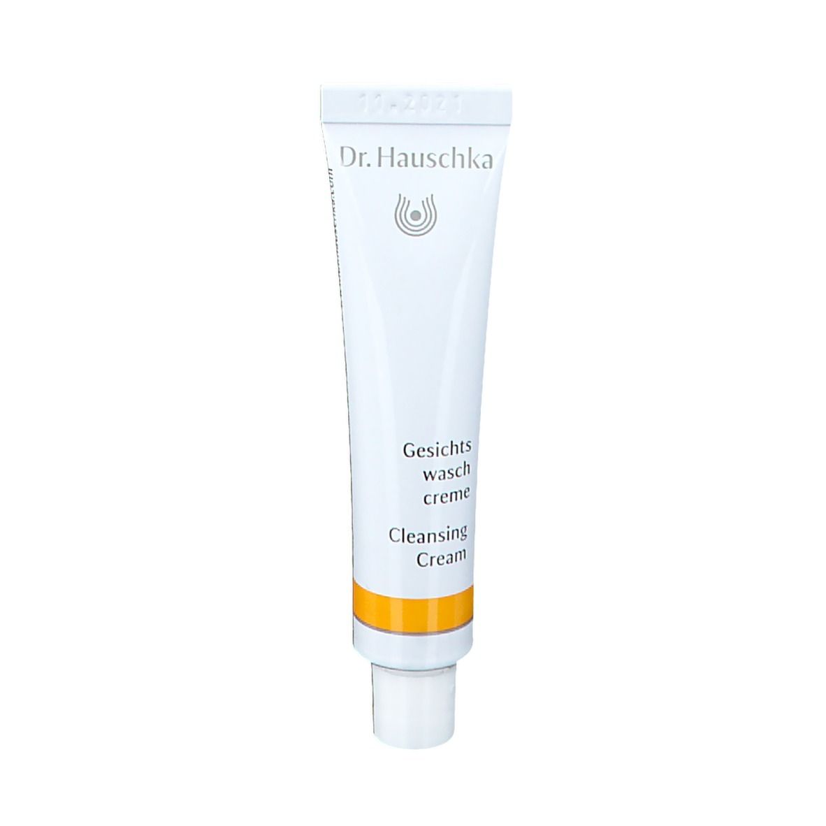 Weiße Tube mit gelbem Streifen. Schriftzug: Dr. Hauschka, Gesichts Waschcreme, Cleansing Cream.