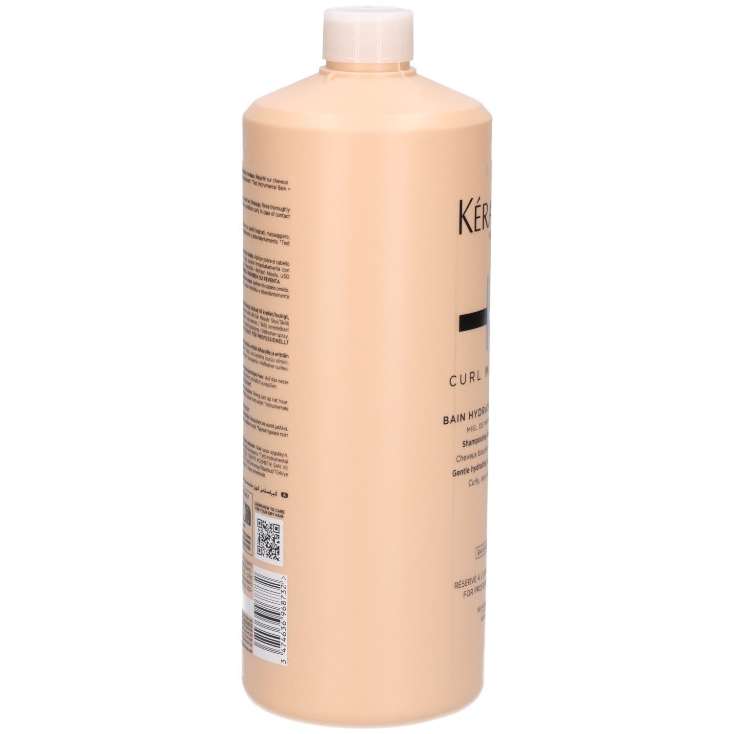Kérastase Curl Manifesto Shampoo, 1 Liter Flasche, Rückseite mit Text.