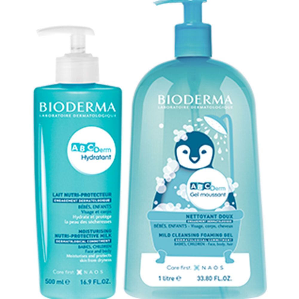 Zwei blaue Flaschen von BIODERMA. Links: ABCderm Hydratant. Rechts: ABCderm Gel moussant. Beide mit Pumpaufsatz.