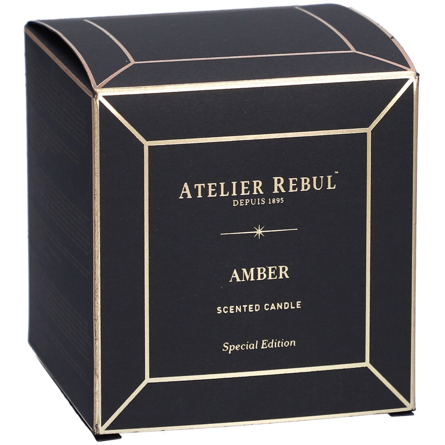 Schwarze quadratische Schachtel mit goldfarbenen Akzenten. Aufschrift: "ATELIER REBUL", "AMBER" und "SCENTED CANDLE".