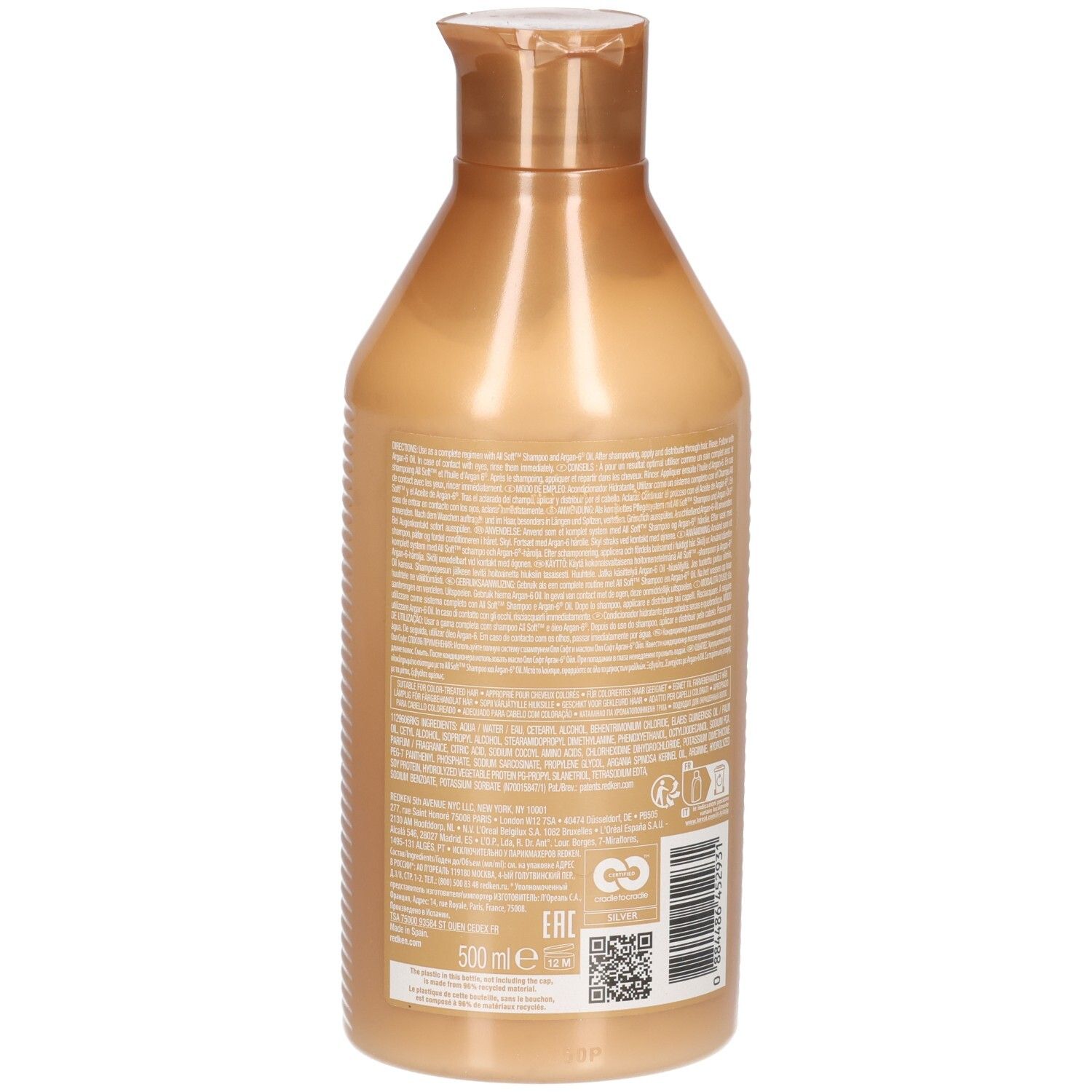 Rückansicht einer goldfarbenen Conditioner-Flasche. Text auf dem Etikett.