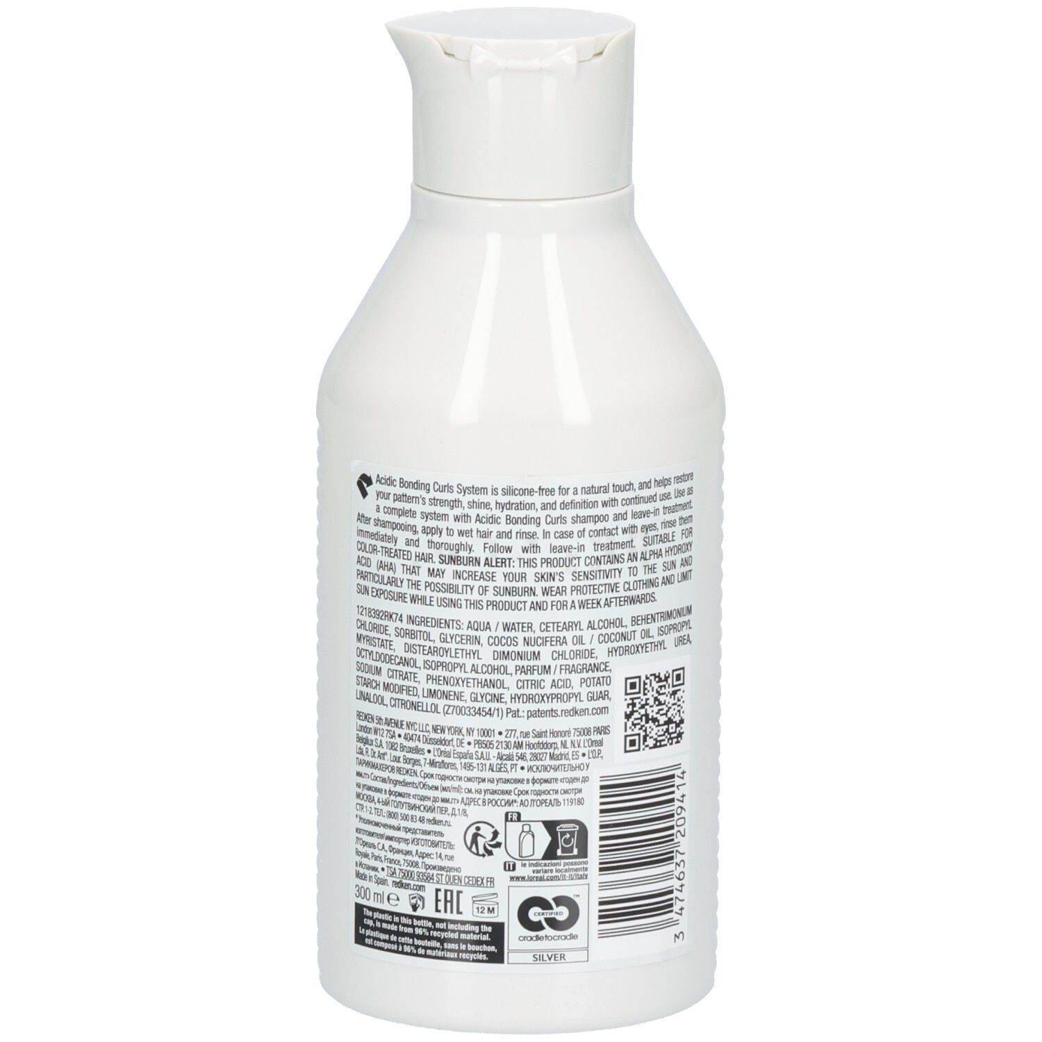 Rückseite der weißen Flasche Redken Acidic Bonding Curls Conditioner. Enthält Inhaltsstoffe, QR-Code und Recycling-Symbole.