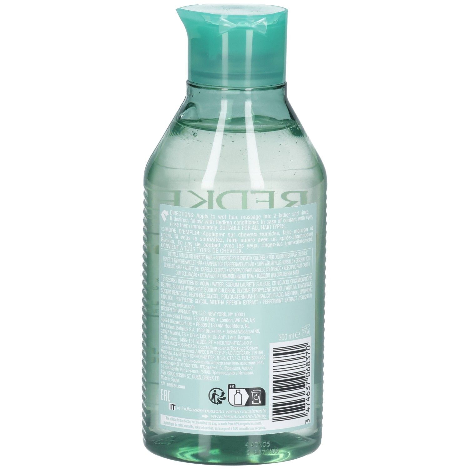 Durchsichtige Flasche mit türkisfarbenem Klappverschluss, gefüllt mit hellgrüner Flüssigkeit. Etikett mit Text und Barcode.