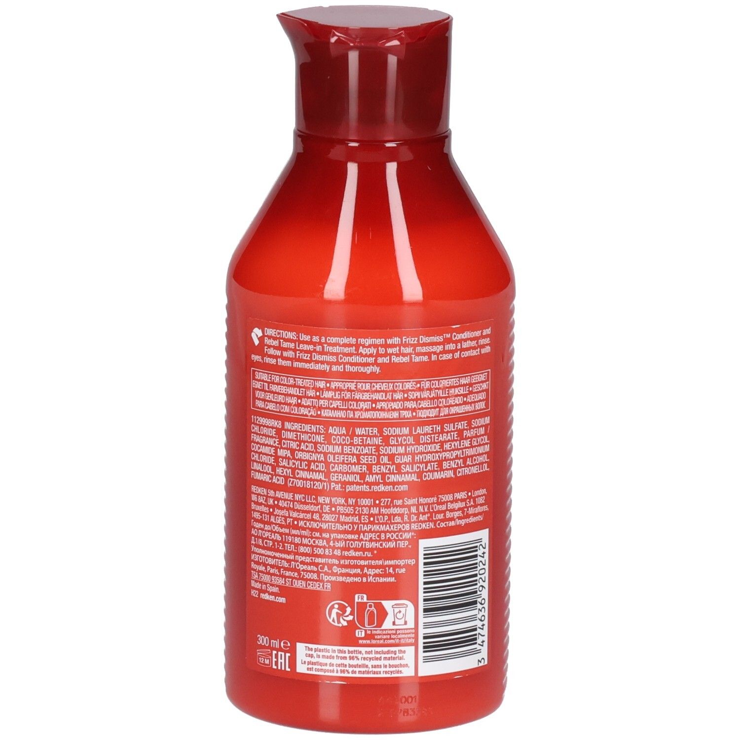 Rückseite einer roten Shampoo-Flasche. Enthält Text über Inhaltsstoffe und Anwendung. Barcode und Logo.