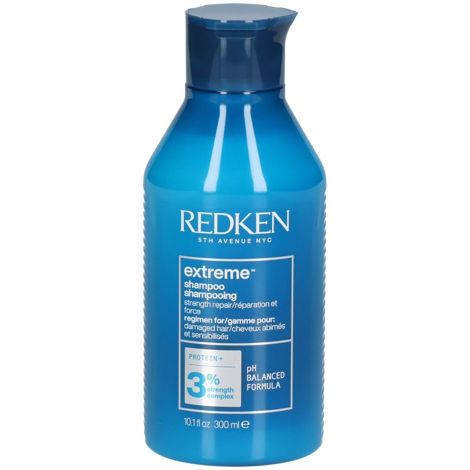 Blaue Shampoo-Flasche. Aufschrift: Redken, extreme shampoo, 3% strength complex, pH balanced formula. 300ml.