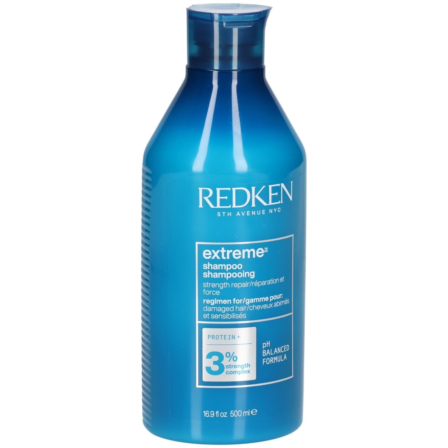 Blaue Shampoo-Flasche. Aufschrift: Redken, extreme shampoo, 3% strength complex, pH balanced formula. 500ml.