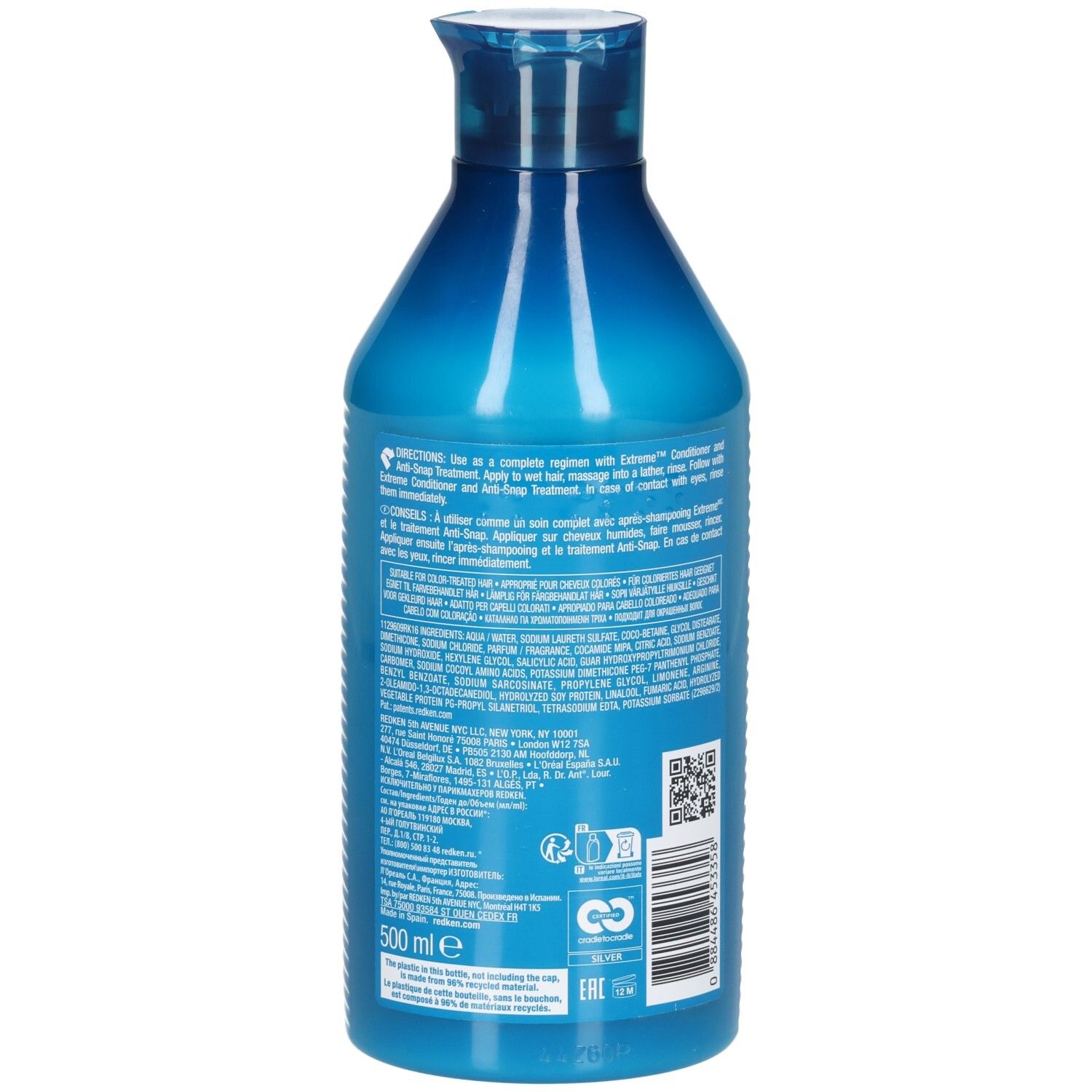 Rückseite der blauen Shampoo-Flasche. Text mit Anweisungen und Inhaltsstoffen. Enthält QR-Code und Recycling-Logo.