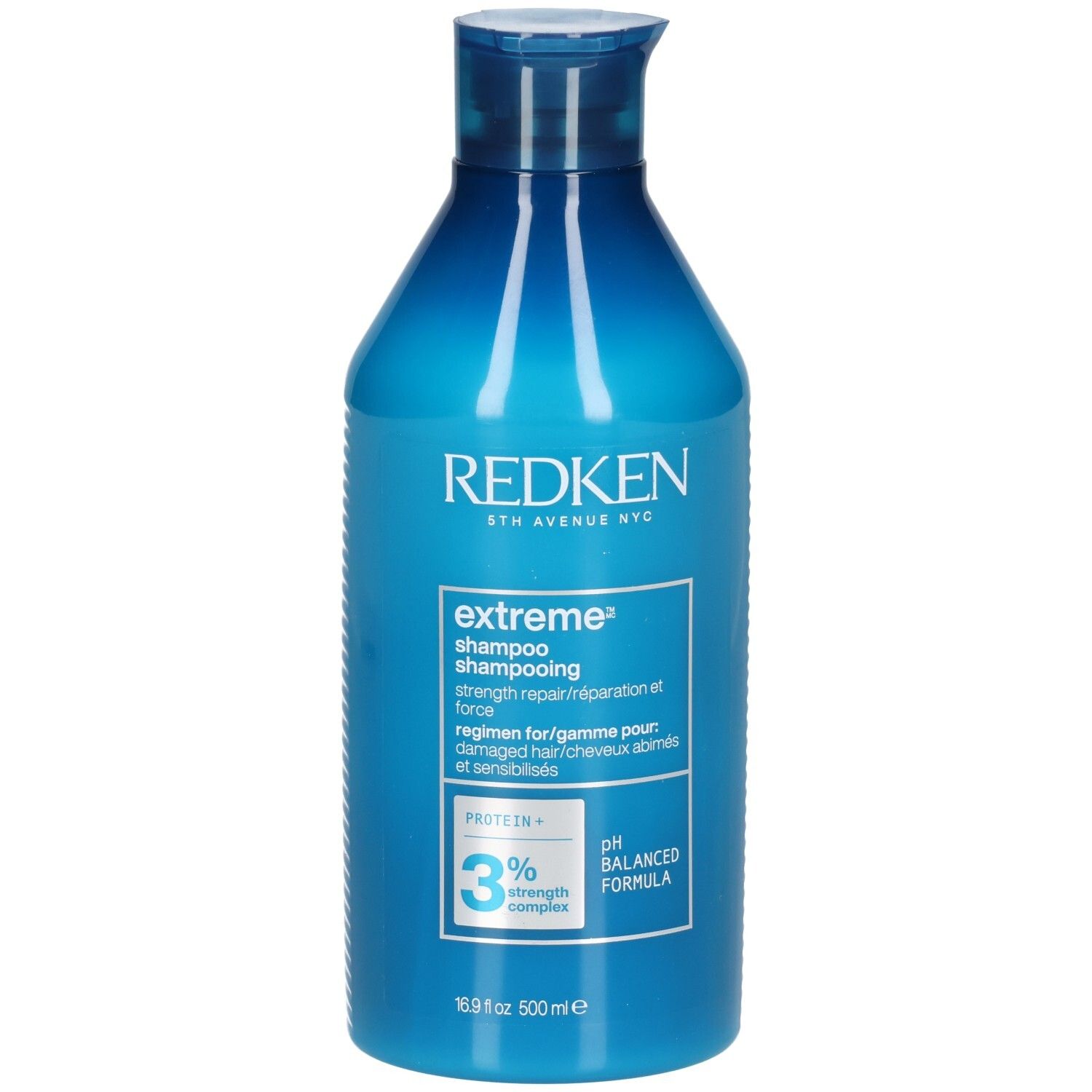 Blaue Shampoo-Flasche. Aufschrift: Redken, extreme shampoo, 3% strength complex, pH balanced formula. 500ml.