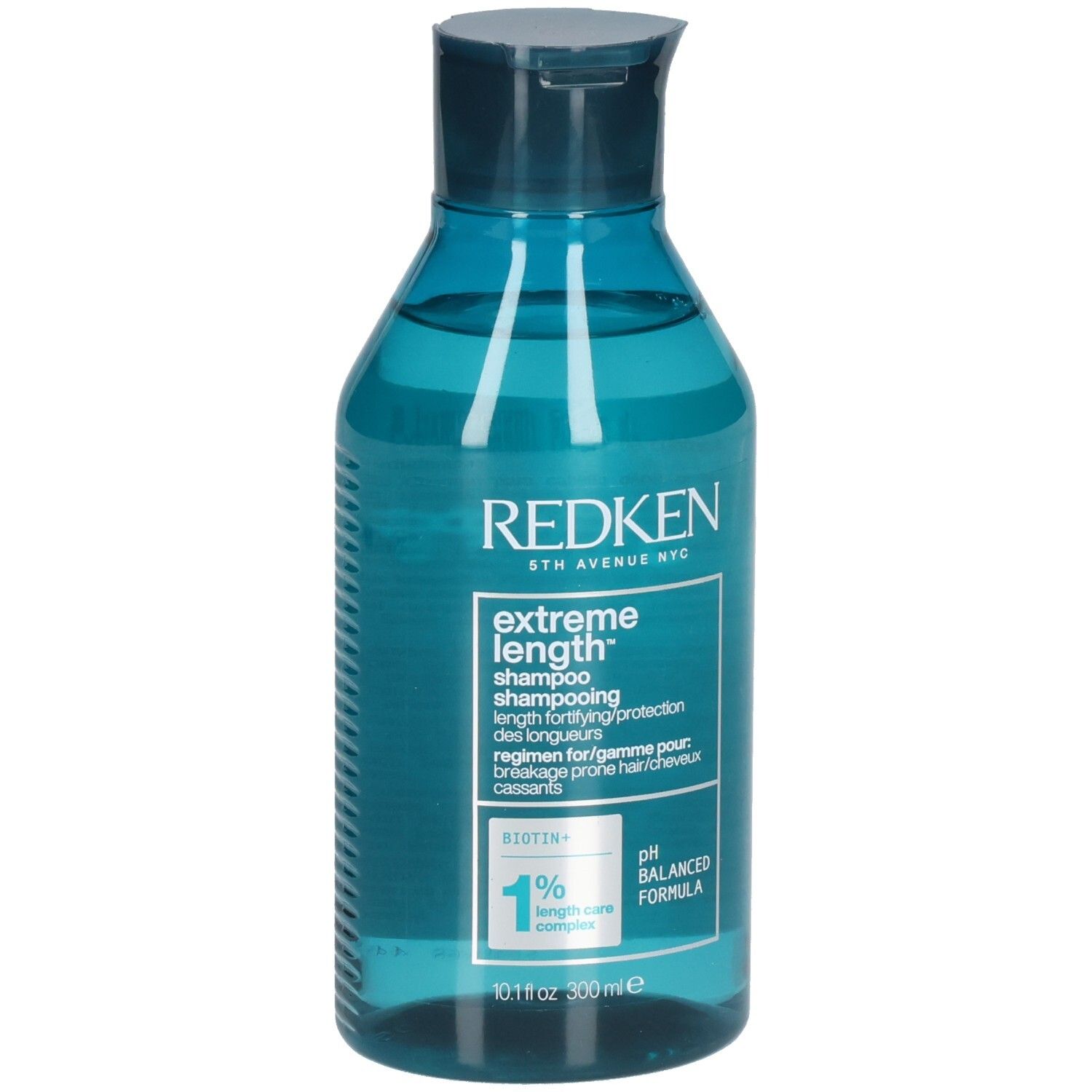 Blau-transparente Shampoo-Flasche. Aufschrift: Redken, Extreme Length Shampoo. Enthält Biotin. pH-ausgewogene Formel.