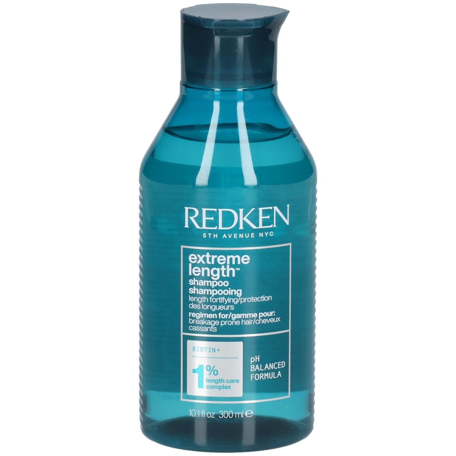 Blau-transparente Shampoo-Flasche. Aufschrift: Redken, Extreme Length Shampoo. Enthält Biotin. pH-ausgewogene Formel.