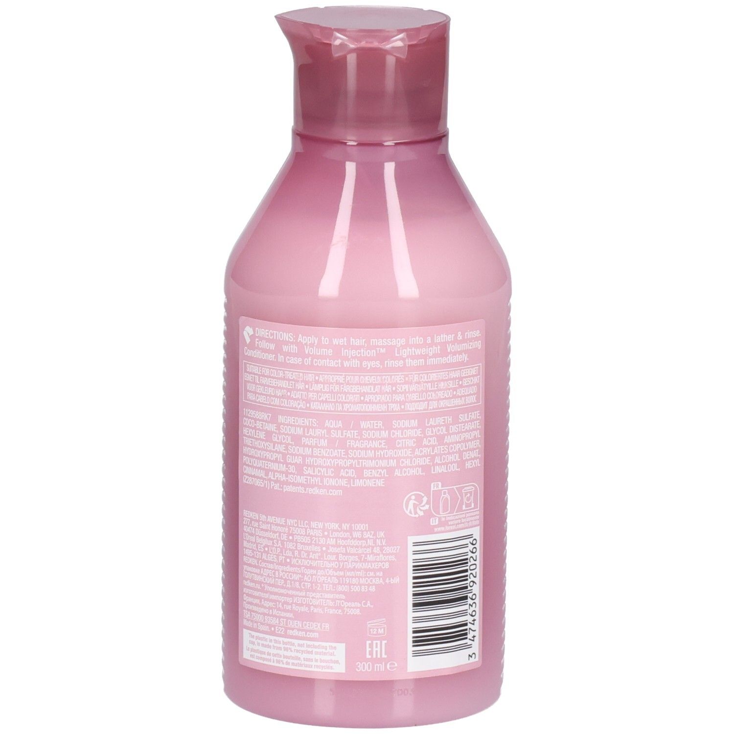 Rückseite einer rosa Shampoo-Flasche mit Text. Barcode und Herstellerinformationen sind sichtbar.