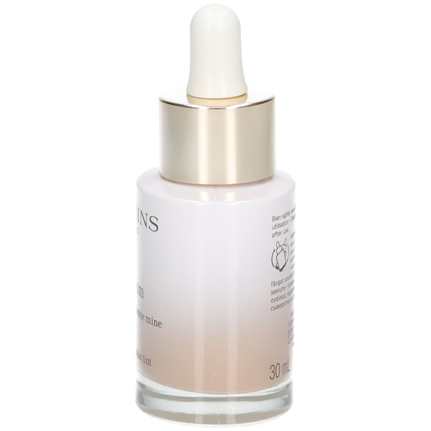 Clarins Tinted Oleo-Serum Flasche mit Pipette, Seite mit Anwendungshinweisen und Volumenangabe 30ml.