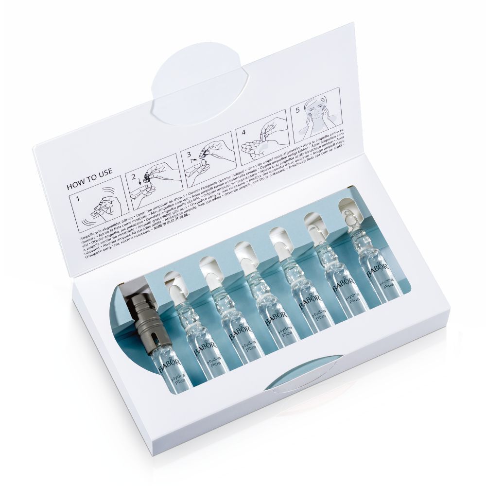 Geöffnete Verpackung mit 7 Babor Hydra Plus Ampullen. Anweisungen zum Öffnen sind auf der Innenseite des Deckels abgebildet.