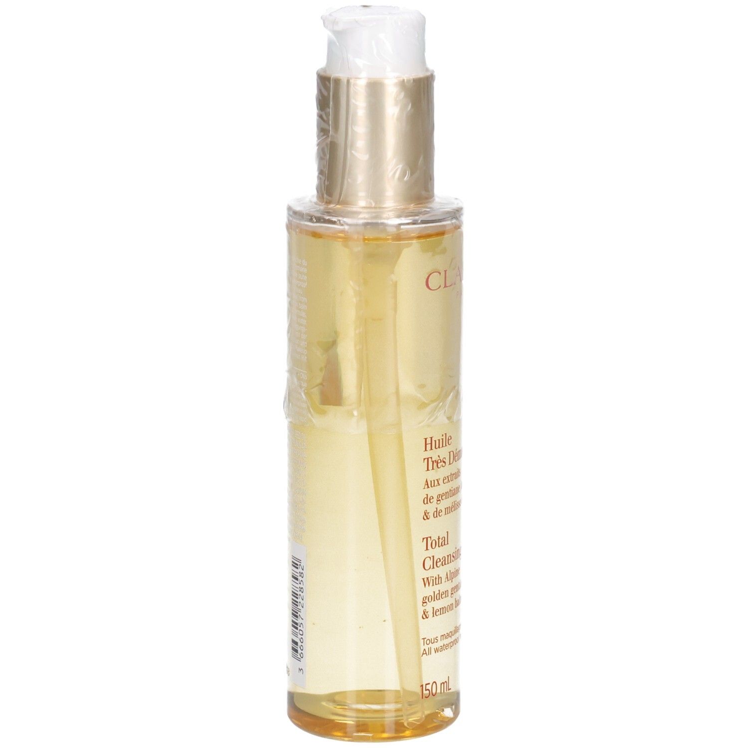 Clarins Total Cleansing Oil: goldene Flüssigkeit in Pumpspenderflasche, Seitenansicht.