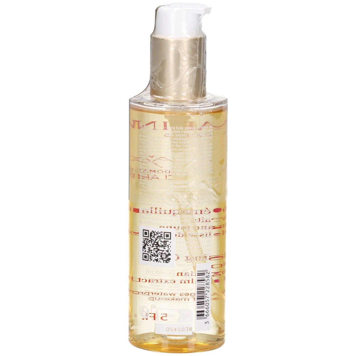 Clarins Total Cleansing Oil: goldene Flüssigkeit in Pumpspenderflasche, Rückansicht mit QR-Code.