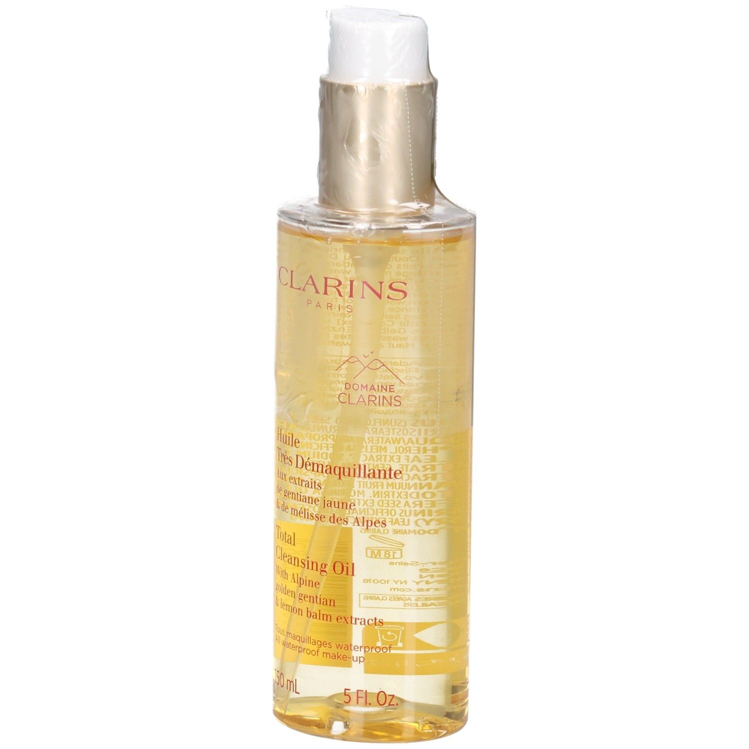 Clarins Total Cleansing Oil: goldene Flüssigkeit in Pumpspenderflasche mit Etikett.