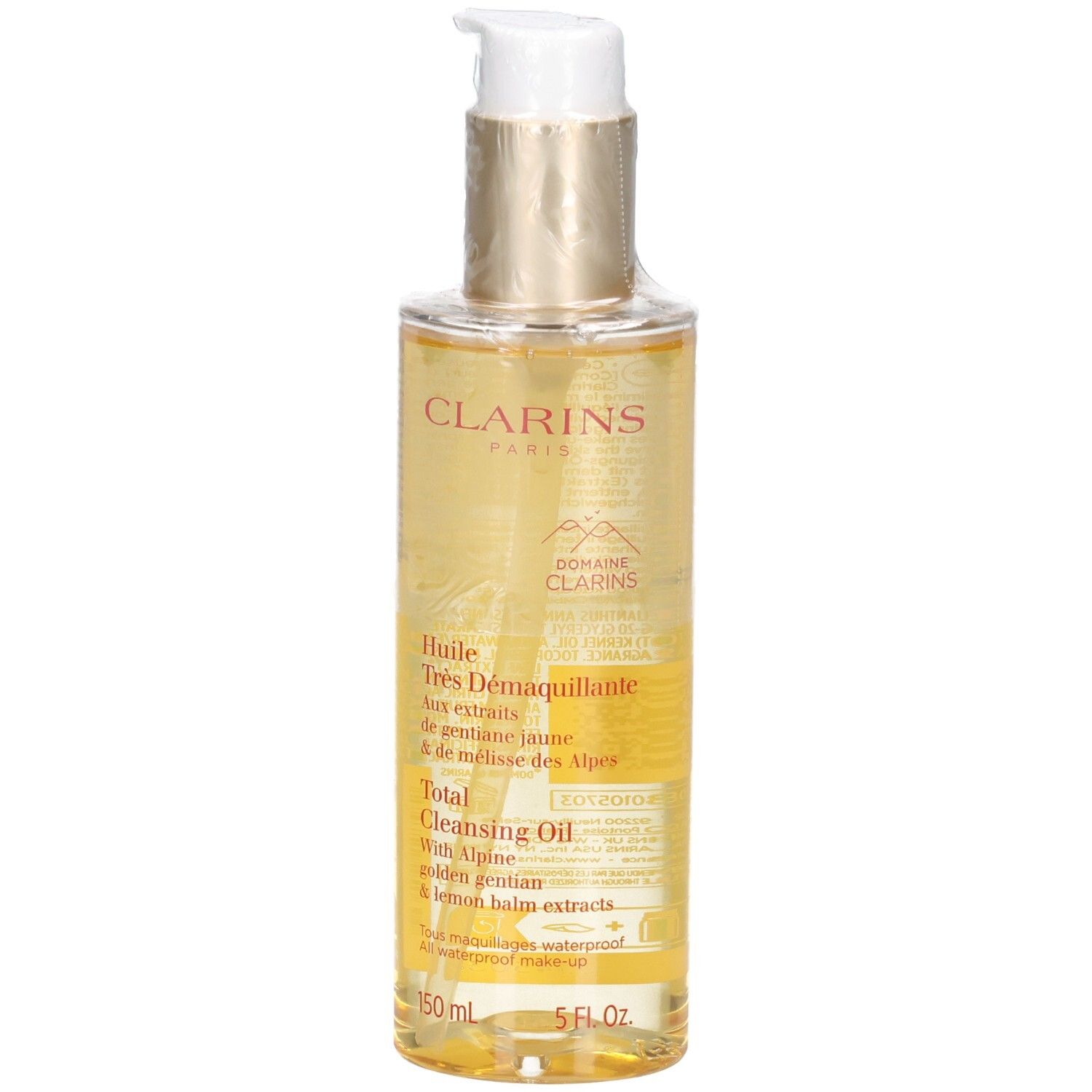 Clarins Total Cleansing Oil: goldene Flüssigkeit in Pumpspenderflasche mit Etikett.
